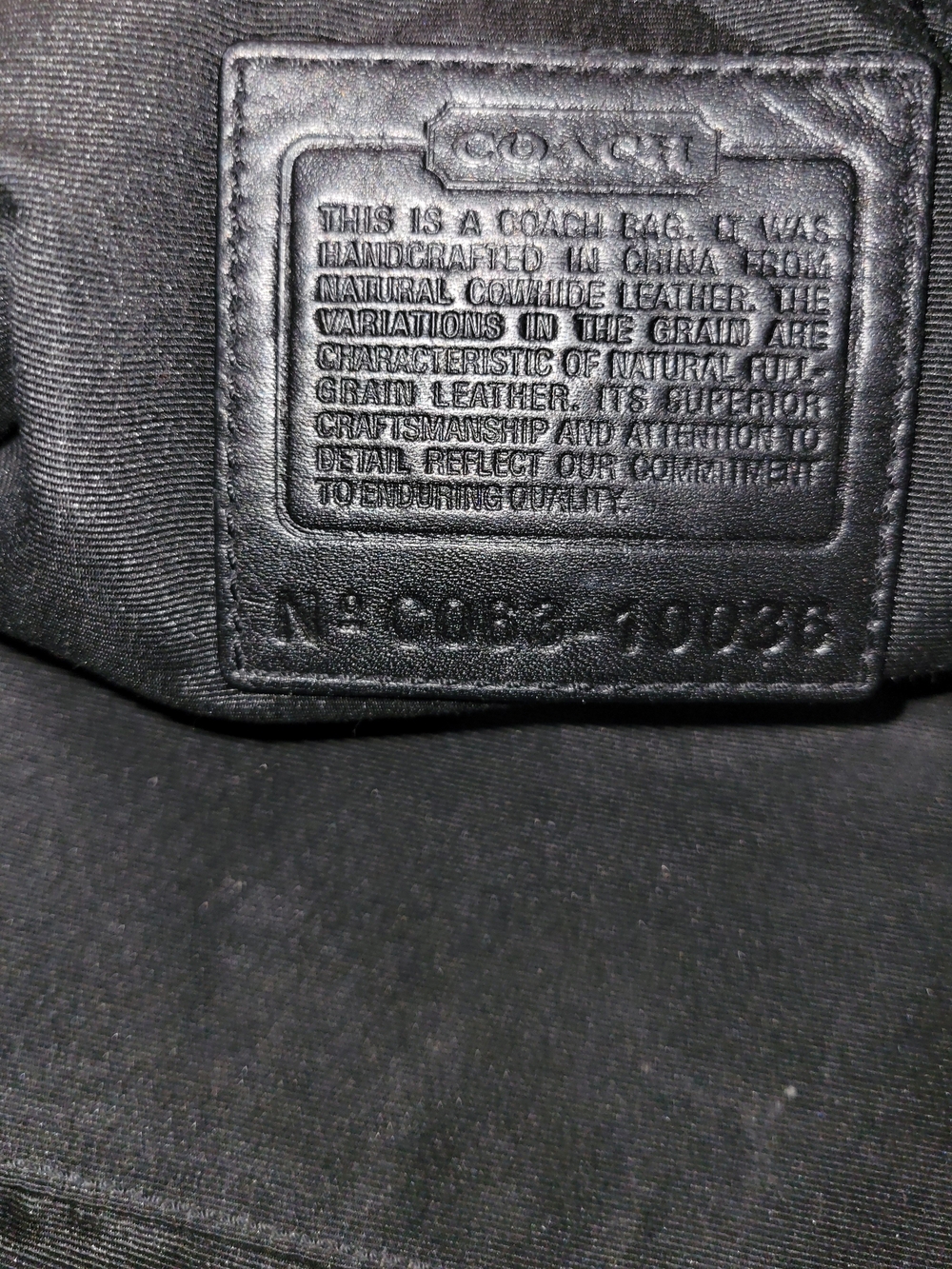 Coach Black Leather Shoulder Bag with Embossed Creed Patch